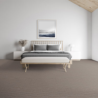 beige pattern carpet in bedroom